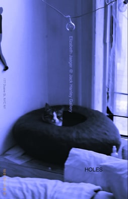 Image of cat inside black ceramic 
