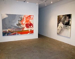 Installation view of two large abstracts