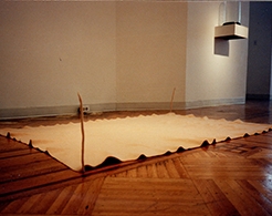 Tarp stretched onto gallery floor