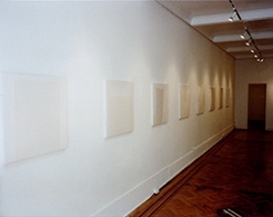 White abstracts on gallery wall