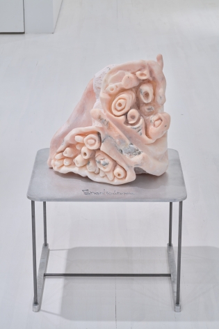 light pink abstract stone sculpture