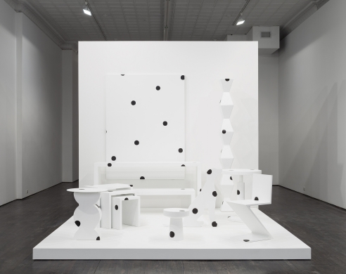 Abstract white furniture with black polka dots