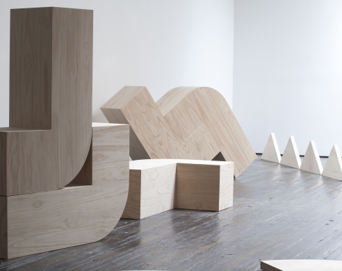 Installation view of In Waves, wooden block sculptures